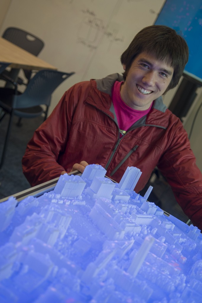 Photo of Al Carter with the 3d model of MIT's campus